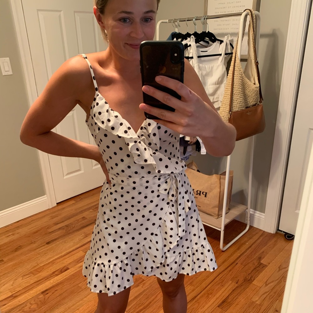 Polka dot ruffle wrap dress